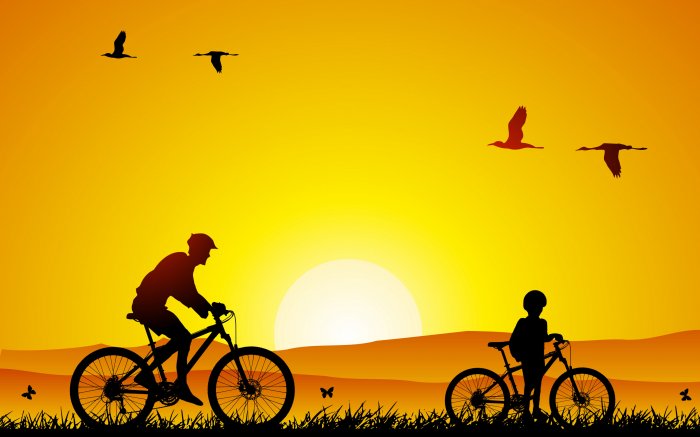 Велосипедисты и птицы в желтых цветах
