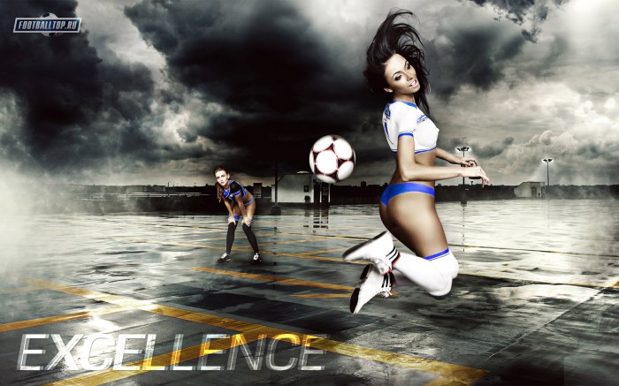 The girl juggles the ball superbly