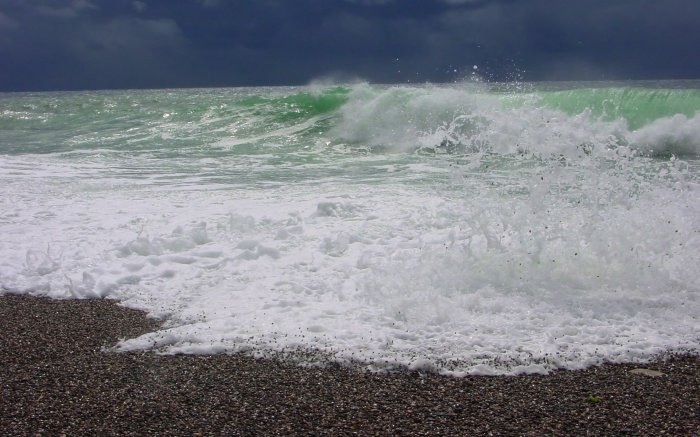 Powerful surf of the green sea