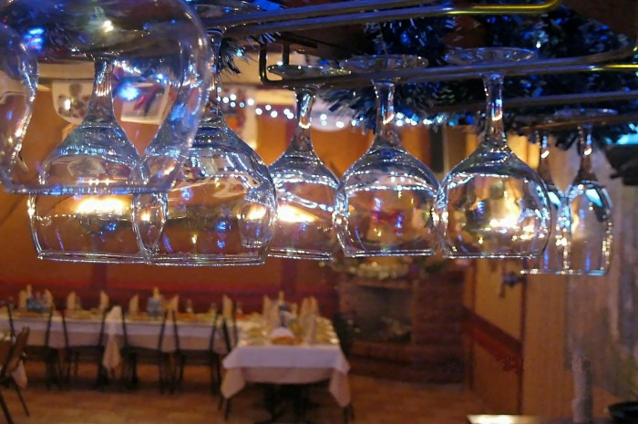 The transparent wineglasses in the bar
